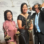 Producer Susan Han, Seattle Channel General Manager Shannon Gee, and videographer Randy Eng hold Emmy trophies. Photo: Maria Zambrano